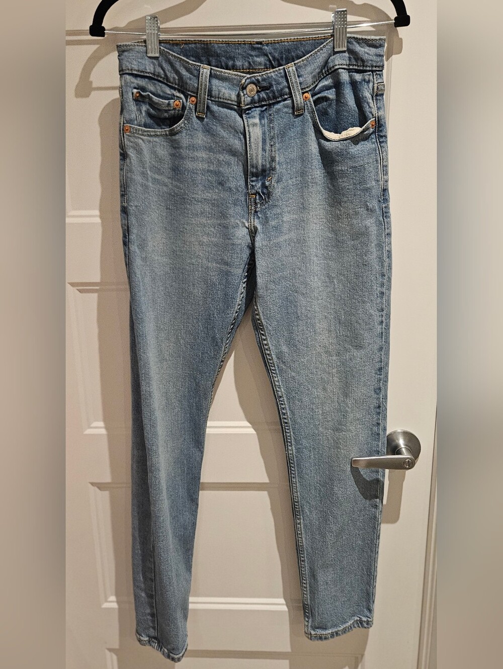 Levi's Light Blue Jeans with Tan Leather Patch and Red Logo